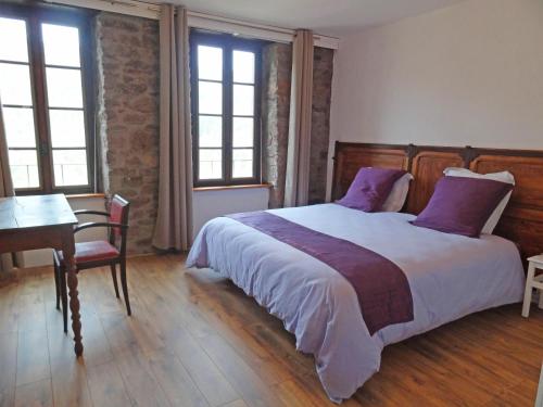 Postel nebo postele na pokoji v ubytování Gîte Dourdou - Les Hauts de Camarès