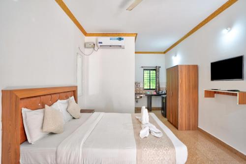 Ένα ή περισσότερα κρεβάτια σε δωμάτιο στο Hotel Albatross