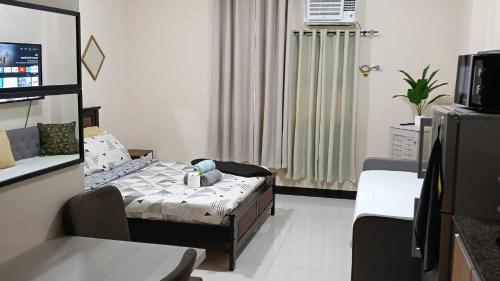 TV/trung tâm giải trí tại Condo Unit walking distance to Manila Airport (NAIA Terminal 3)