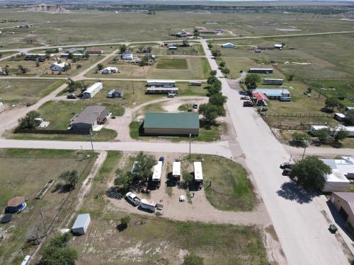 an aerial view of a parking lot with buses at Grasshopper Flats RV Pad in Interior