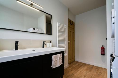 Et badeværelse på Locations Tourcoing - Le Cassel