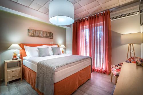 Villa Rivazzurra tesisinde bir odada yatak veya yataklar