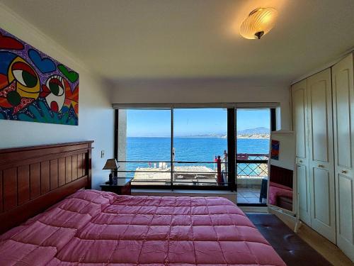 Ένα ή περισσότερα κρεβάτια σε δωμάτιο στο Hermoso depto en Higuerillas Primera Linea