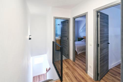 En eller flere senge i et værelse på La Casita de Helen