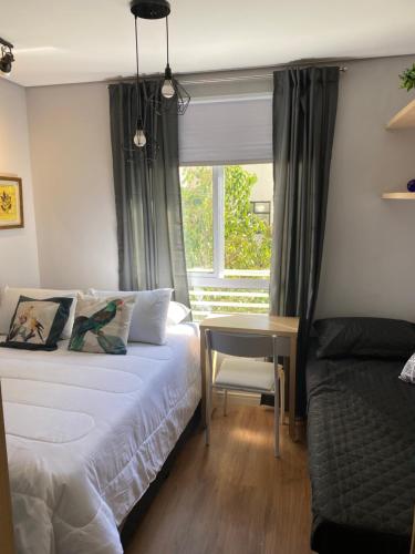 Postel nebo postele na pokoji v ubytování Apartamento Perto Paulista, Liberdade e Metrô