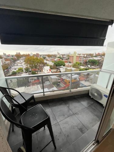 Un balcón o terraza de Departamento completo con excelente ubicacion