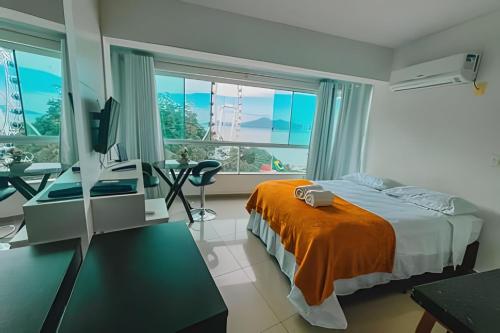 Katil atau katil-katil dalam bilik di Loft vista panorâmica da Roda gigante e orla de BC
