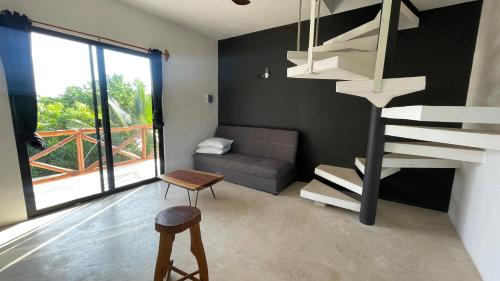 Posezení v ubytování Casa Tekio Holbox By Kin Studios