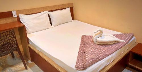 Cama o camas de una habitación en Mandakini palace