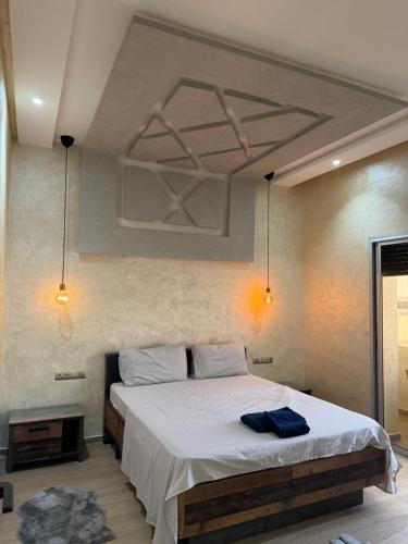 Ένα ή περισσότερα κρεβάτια σε δωμάτιο στο Modern and Luxury appartement centre of agdal