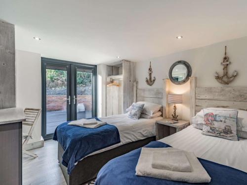 Ένα ή περισσότερα κρεβάτια σε δωμάτιο στο 3 Bed in Bamburgh 79249