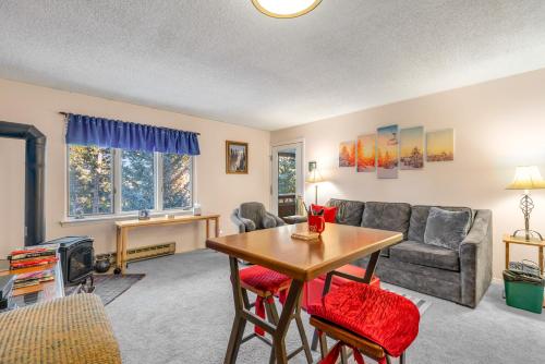 a living room with a couch and a table at Grandview Condo in Breckenridge