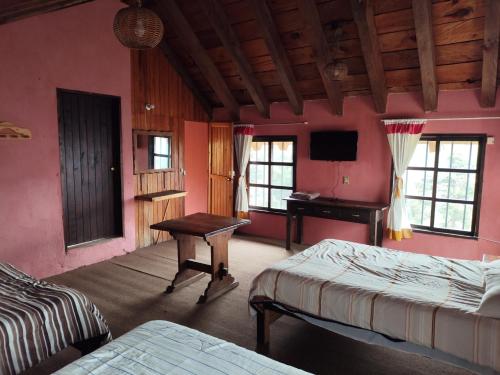 En eller flere senge i et værelse på Cabañas la garita2