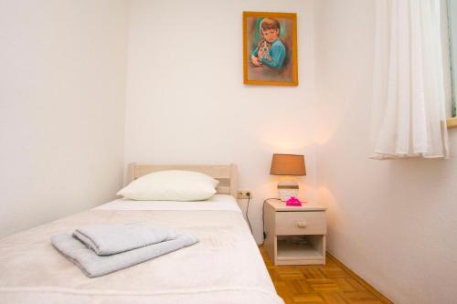Postel nebo postele na pokoji v ubytování House Pansy