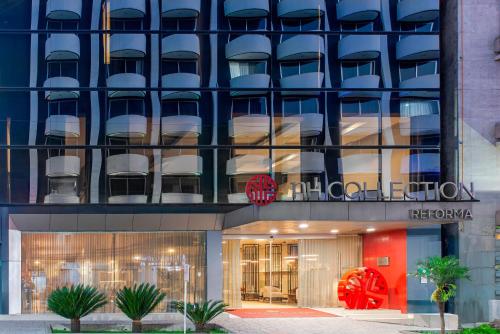a facade of a hotel with a red and black building at NH Collection Mexico City Reforma in Mexico City