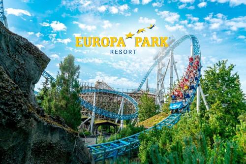 a roller coaster at a roller coaster park at L'Ecrin Alsacien - Proche Europa Park - Idéal Famille & Professionnel - Commerces à Proximité in Erstein