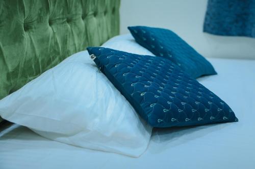 Ένα ή περισσότερα κρεβάτια σε δωμάτιο στο Maneva Comforts