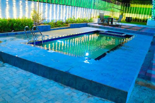 Πισίνα στο ή κοντά στο Maneva Comforts