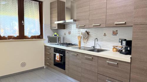 Kuchyň nebo kuchyňský kout v ubytování La Casa degli Angeli