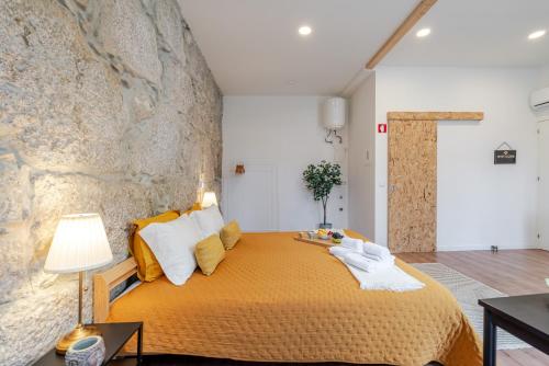 Postel nebo postele na pokoji v ubytování DesKanzo Guest House - Raúl Doria