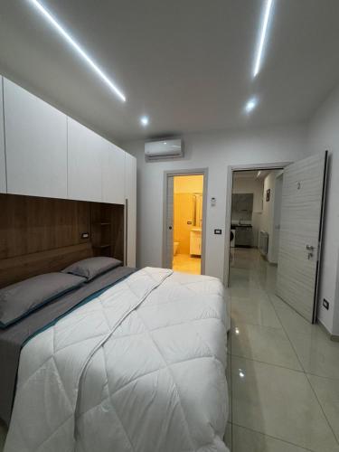 Ένα ή περισσότερα κρεβάτια σε δωμάτιο στο Roxy's Home in Rome