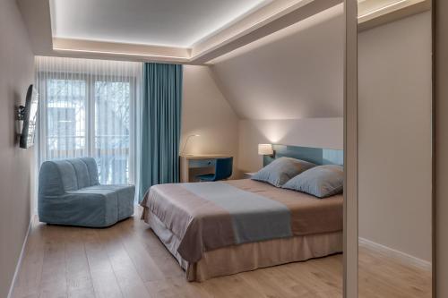 Ένα ή περισσότερα κρεβάτια σε δωμάτιο στο Villa Wierchy