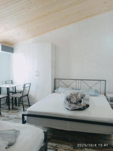 Ένα ή περισσότερα κρεβάτια σε δωμάτιο στο Отель Мечта Кобулети