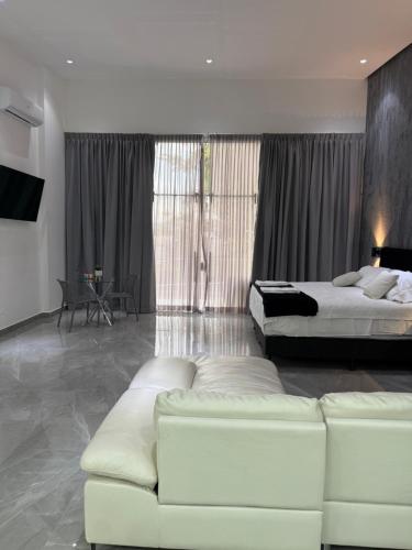 Ένα ή περισσότερα κρεβάτια σε δωμάτιο στο Penthouse 333