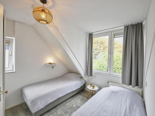Un pat sau paturi într-o cameră la Villa Christina