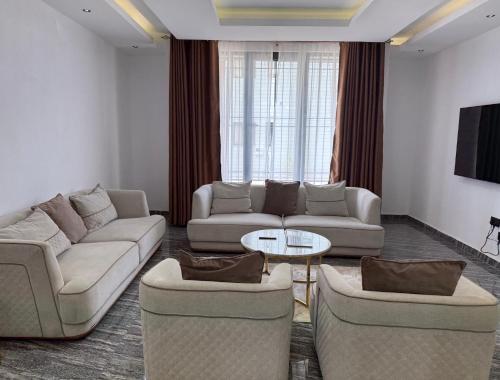 Posezení v ubytování Aberdeen Affordable Luxury Apartment