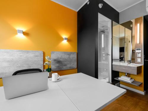 Ένα ή περισσότερα κρεβάτια σε δωμάτιο στο ibis budget Santiago Providencia