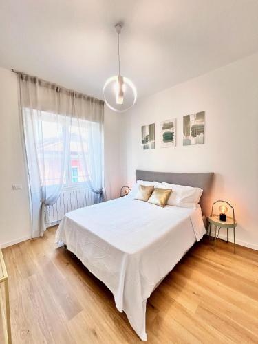 Ένα ή περισσότερα κρεβάτια σε δωμάτιο στο Charming Stay Bergamo City Center