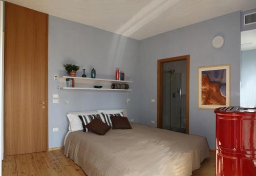 a bedroom with a large bed in a room at Agriturismo Gallegati in Faenza
