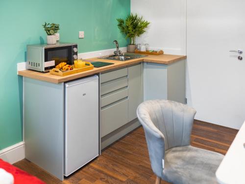 Kuchyň nebo kuchyňský kout v ubytování Hilltop Apartment 8 - Uk50600