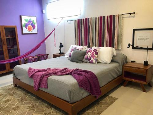 Postel nebo postele na pokoji v ubytování Villa Nelly