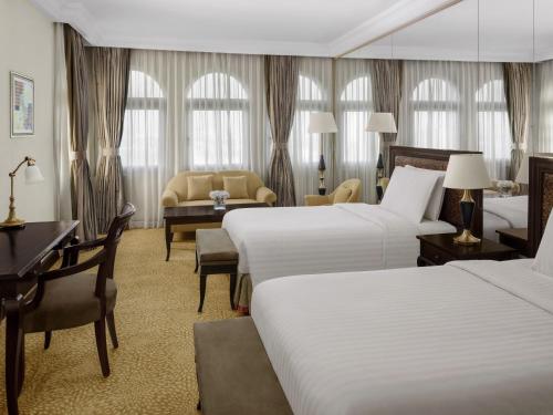 Una cama o camas en una habitación de Mövenpick Hotel Karachi
