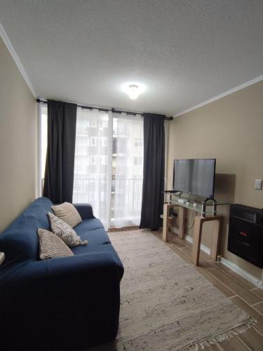 TV a/nebo společenská místnost v ubytování Departamento valle volcanes, Puerto Montt