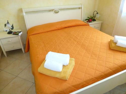 Кровать или кровати в номере Villetta Luisella