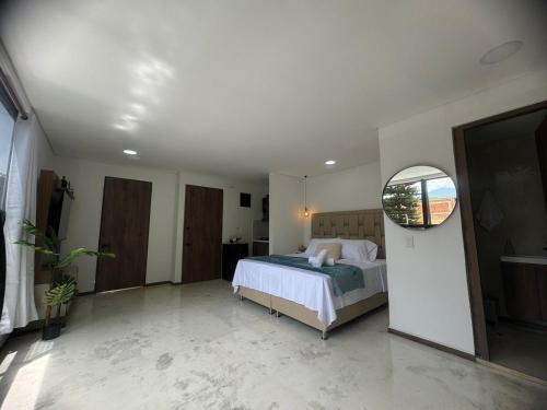 En eller flere senge i et værelse på Faro 201, 202, 203 Lujo en Laureles Ubicación Premium