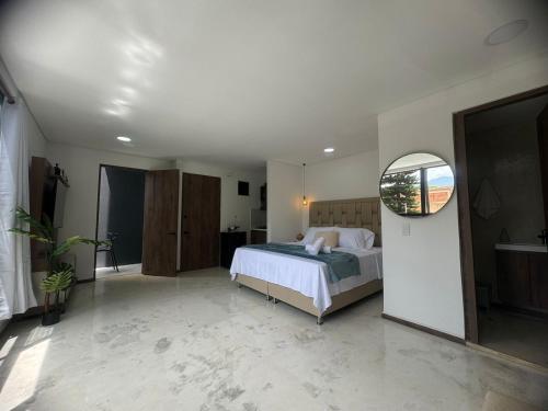 En eller flere senge i et værelse på Faro 201, 202, 203 Lujo en Laureles Ubicación Premium