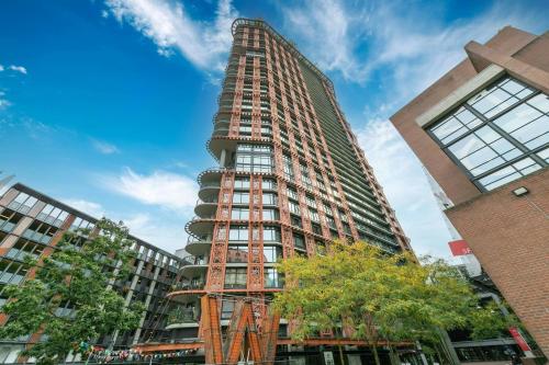 a tall building is being constructed in a city at Historic Downtown Escape in Vancouver