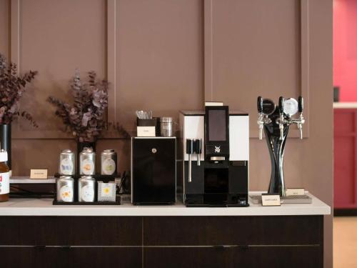 a counter with items on top of it at Mercure Perth On Hay in Perth