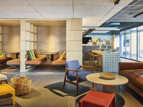 Et opholdsområde på Ibis Budget Paris porte de la Chapelle - Aréna