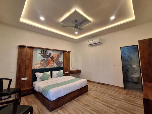 Postel nebo postele na pokoji v ubytování Orchard Hills Resorts