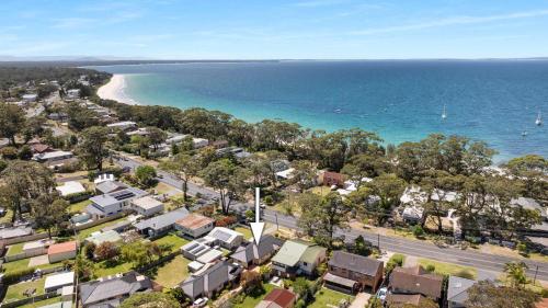 an aerial view of a suburb next to the ocean at Beach Holiday Villa Jervis Bay in Vincentia