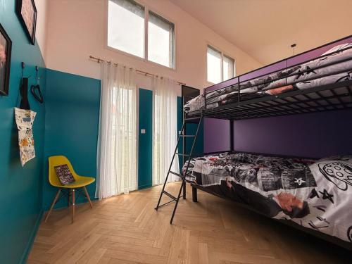 Cama o camas de una habitación en La boîte à souvenirs