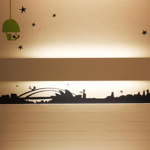 an illustration of a city with stars and a bridge at The Phoenix Hotel Bangkok - Suvarnabhumi Airport in Lat Krabang
