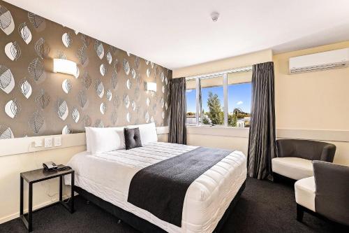 Postel nebo postele na pokoji v ubytování Hotel Elms Christchurch, an Ascend Collection Hotel