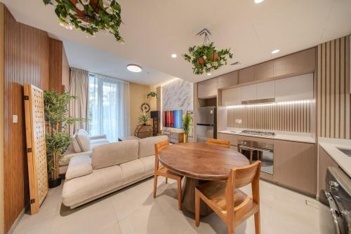 Una cocina o kitchenette en 2BR Tree House in AlJada by Arada - 3WC- Workstation