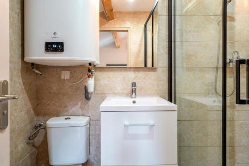 Koupelna v ubytování Canto Cigalo Duplex 13